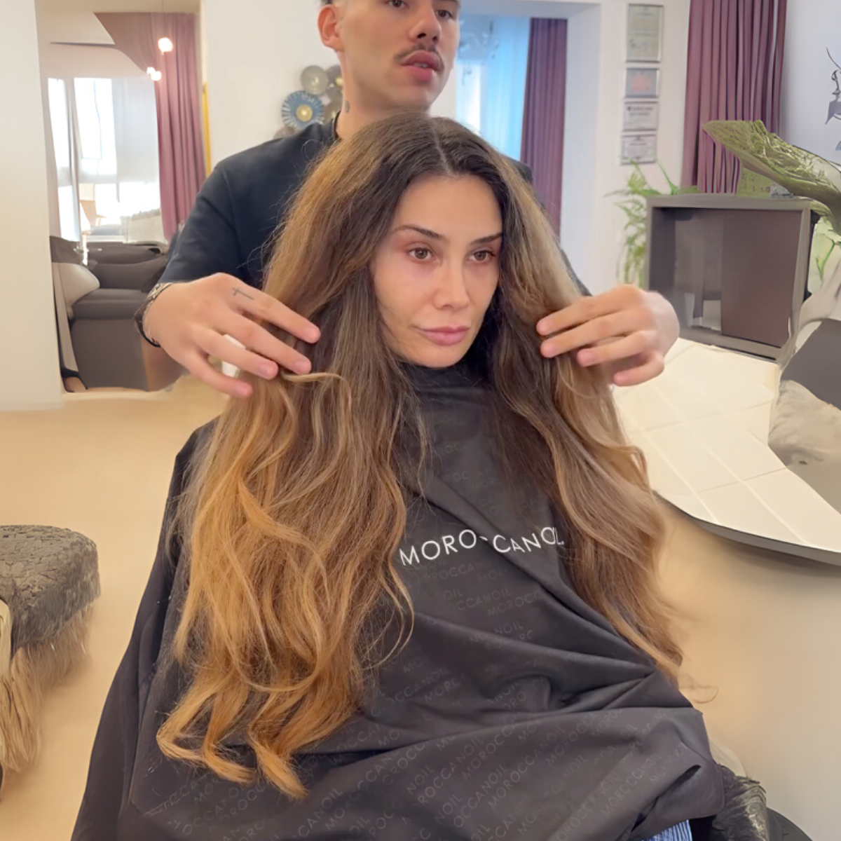 Vasile doing a consultation on long grown out roots