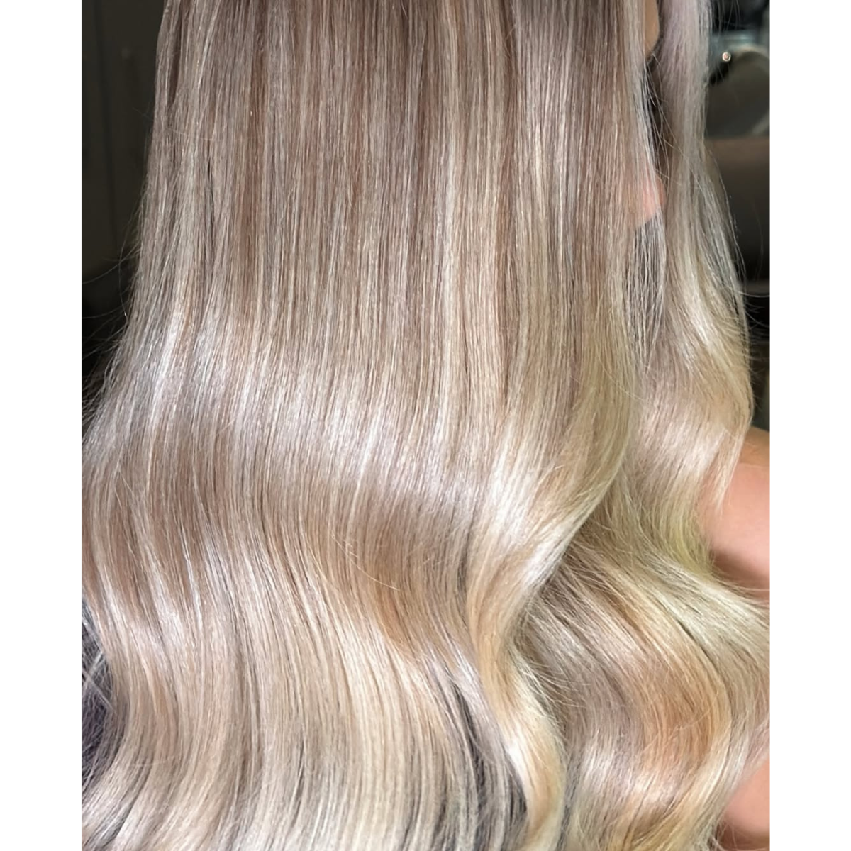 glossy luminous Pearl blonde hair side view