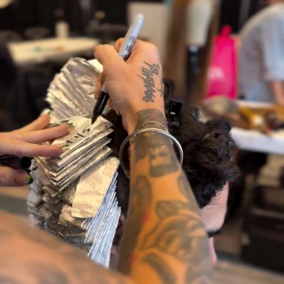 men's Pearl blonde hair platinum card foils with time written on them